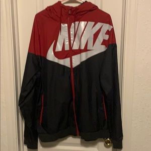 Red and black Nike wind runner
